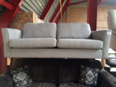 Beige Upholstered Three Seater Sofa