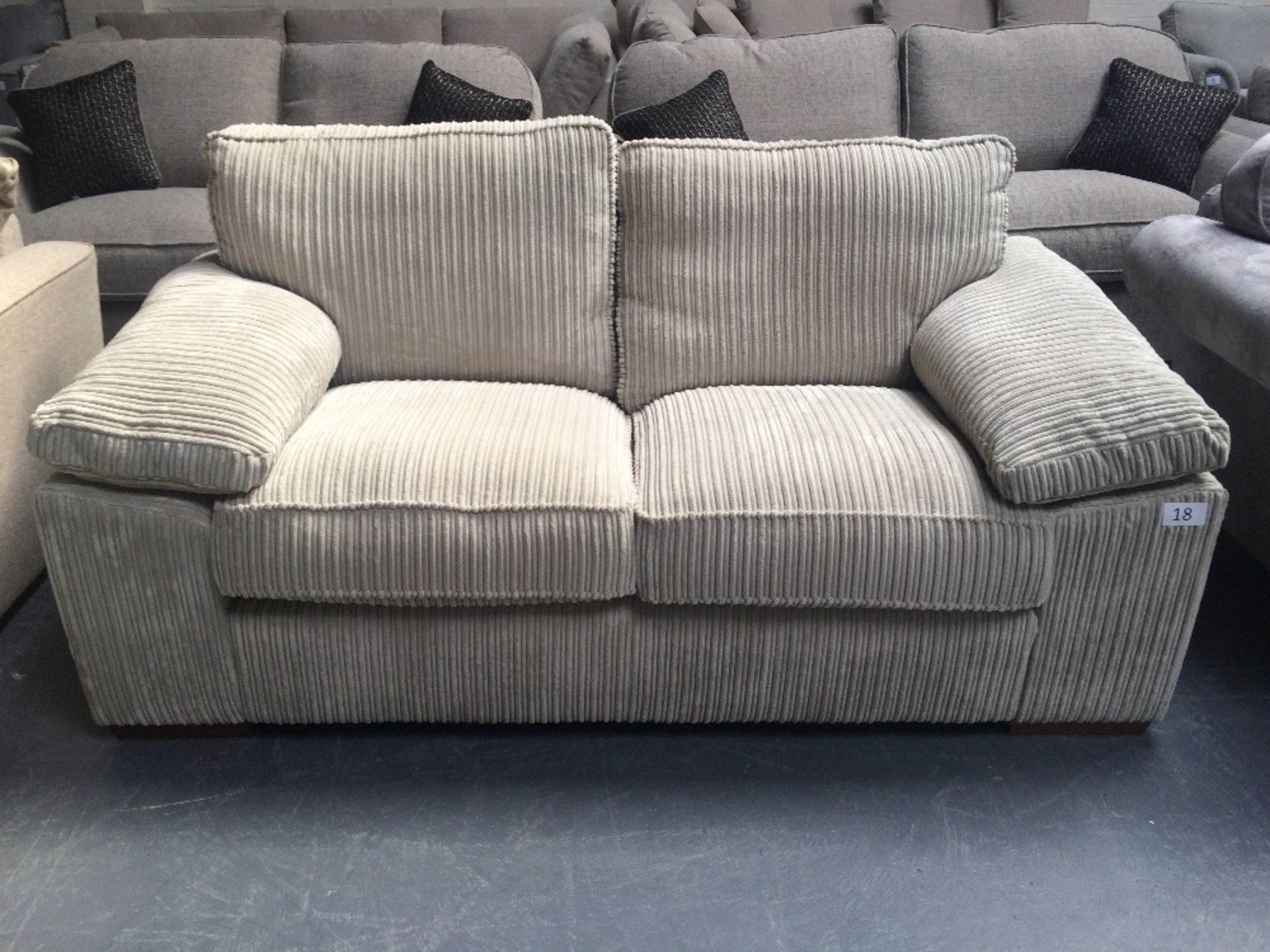 Beige Upholstered Two Seater Sofa