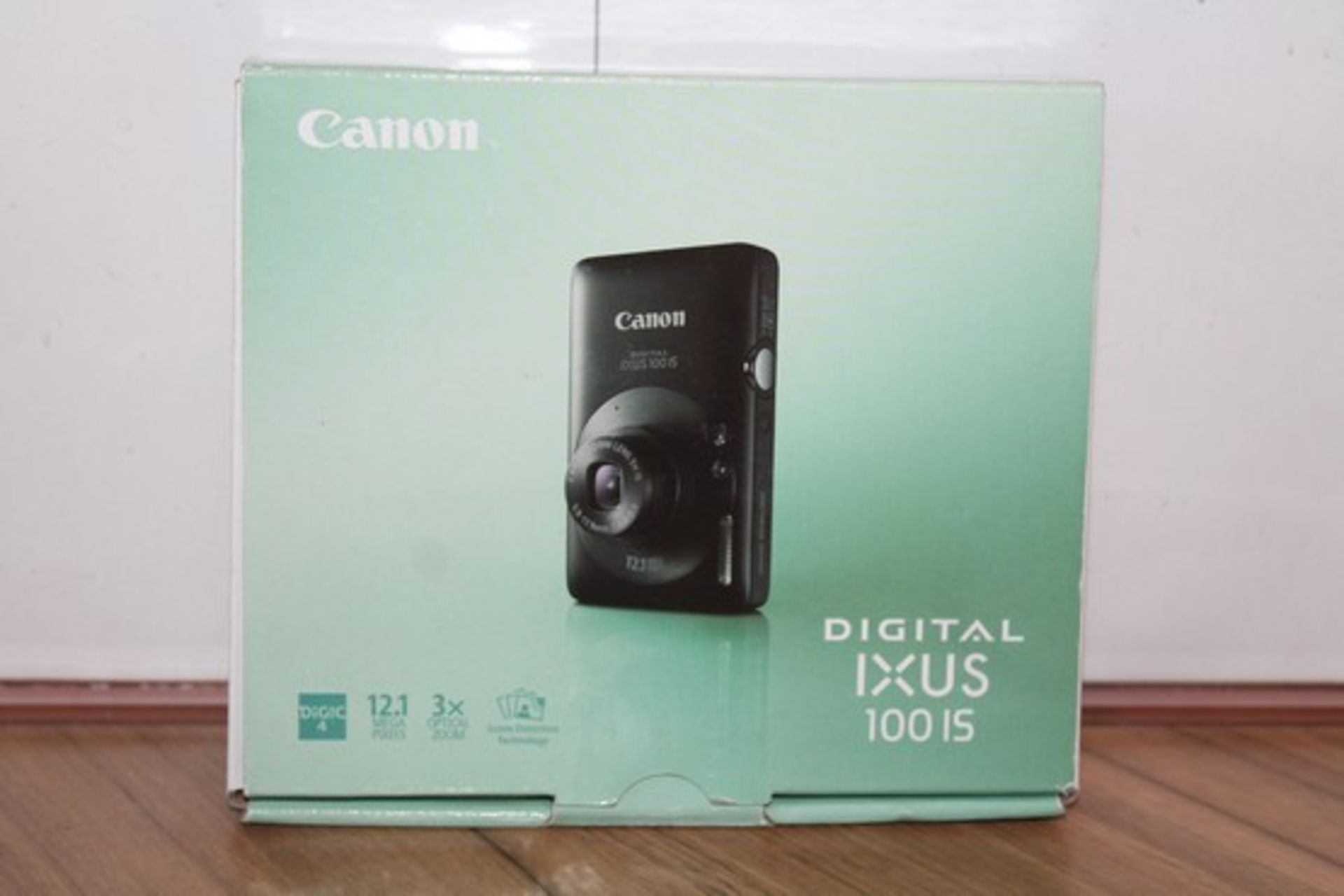 BOXED BRAND NEW CANON IXUS 100 IS DIGITAL CAMERA (DS-SALVAGE)