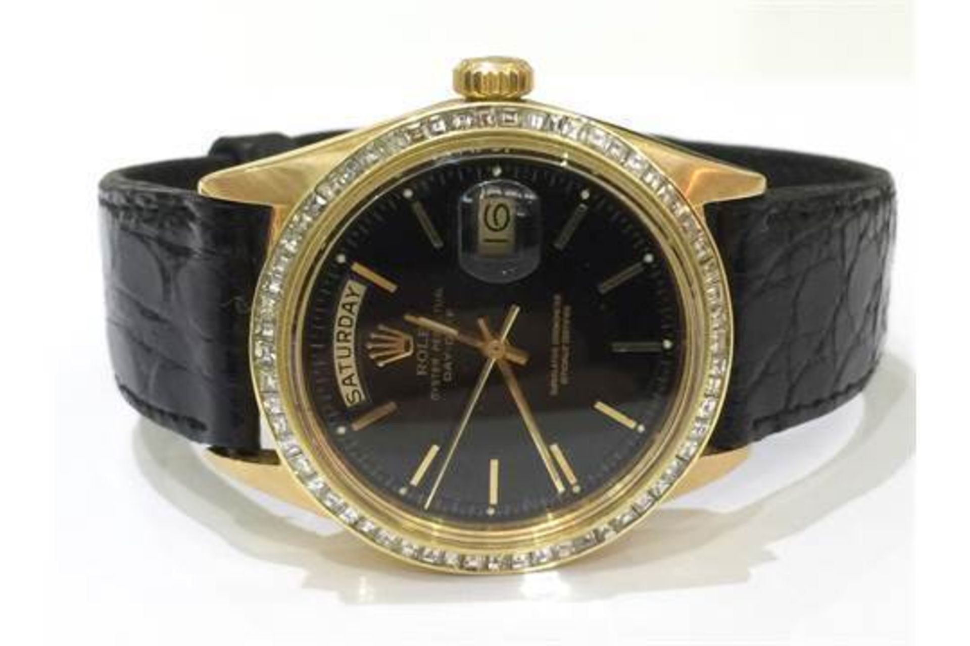 GENTS 18CT ROLEX DAY DATE WITH BLACK FACE AND NUMERALS, SET WITH A 2CT PRINCESS CUT DIAMOND BEZEL,