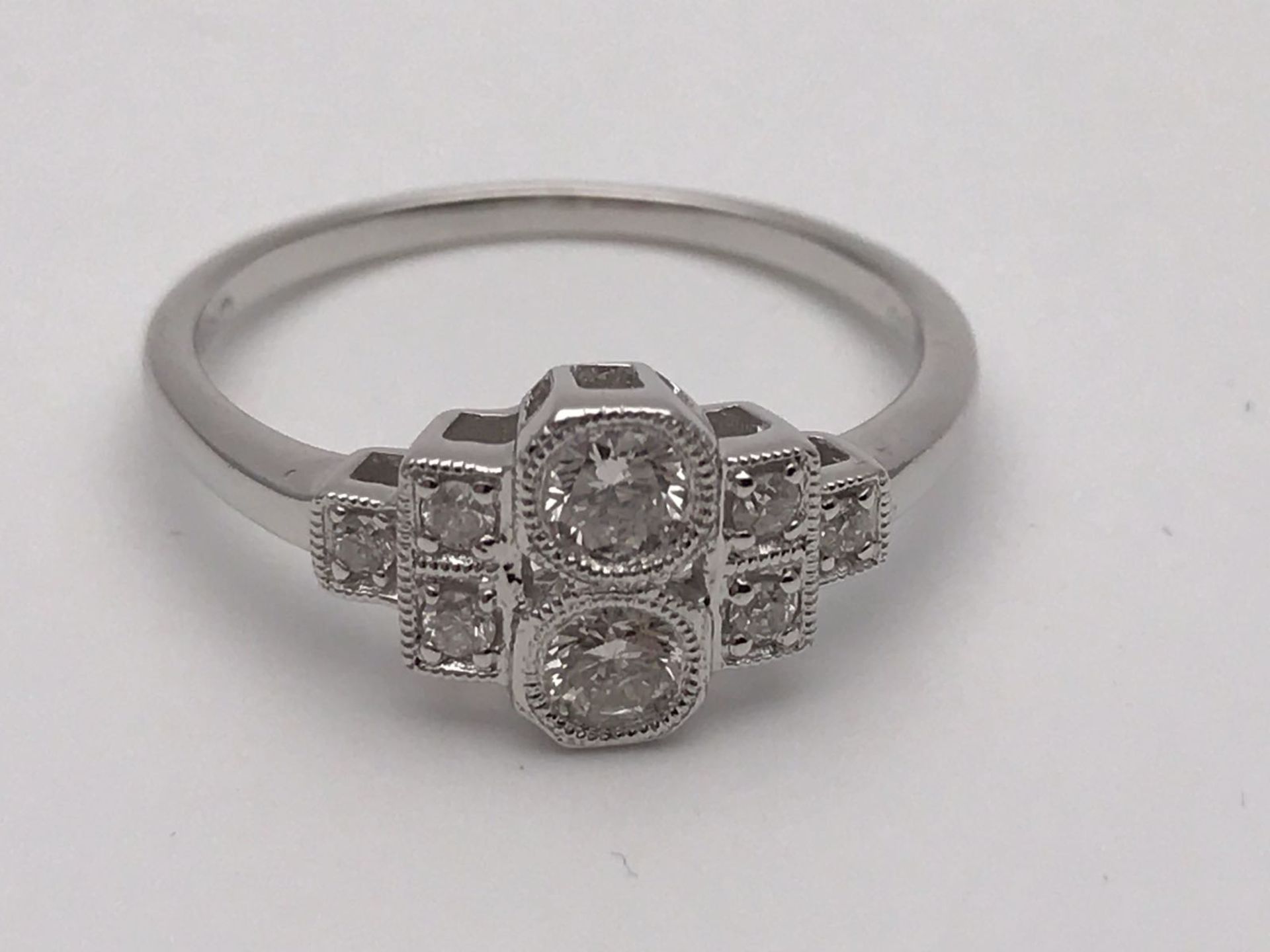 RRP £3000 A STUNNING WHITE GOLD DIAMOND RING COMPRISING 8 BRILLIANT ROUND DIAMONDS OF TOP QUALITY- - Image 2 of 4