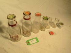 Milk bottles consisting of a 2pt (rare), 1½pt (very rare), 1pt, ½pt, ?pt, ¼pt (very rare) and 2fl.