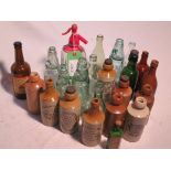 Rare collection of 23 bottles some from Guildford, Aldershot, Ripley, Woking, etc. plus Jones
