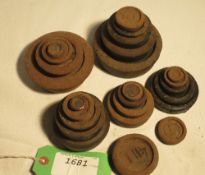 Assortment of flat circular iron weights