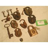 Assortment of locks and keys, some hand-made