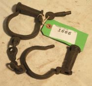 Gamekeeper's handcuffs including a key