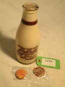 2pt milk bottle from Victoria Farm Dairy, Brookwood, Surrey with a selection of card tops and goat's