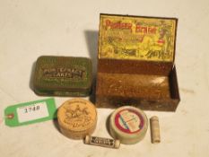 Assorted tins: Pioneer Gold Flake, Pontefract Cakes, DDT, Propert's Saddle Soap, etc.