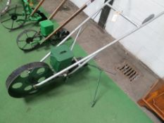 Single row pedestrian root drill