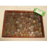 Display case of world coins, including British pre-decimal (farthing, tanner, silver 3d bit, etc.)