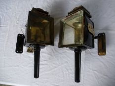 Pair of black/whitemetal square fronted lamps with brackets and pagoda tops engraved Million Guiet &