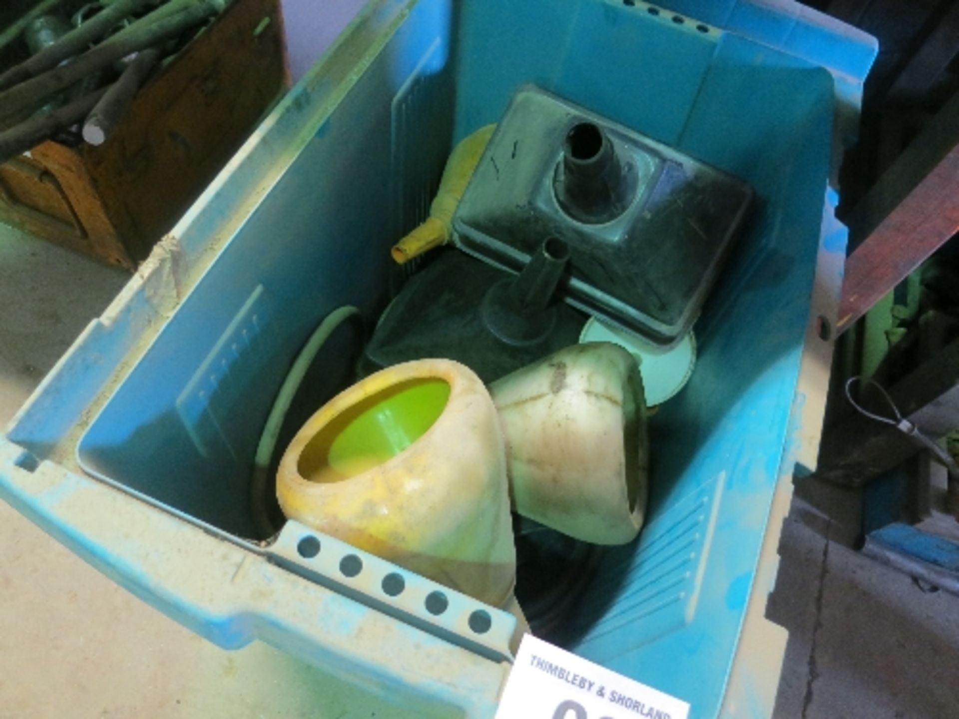 Quantity of assorted oil jugs and funnels