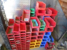 Quantity of plastic storage bins c/w racking