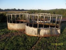 3 round cattle feeders