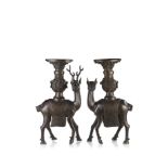 A pair of bronze deers, each carrying an ornate vase on the back (losses) China, 17th/18th