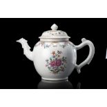 A globular teapot and cover enamelled in Famille Rose and gilt (hairline crack to one side) China,