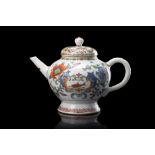 A teapot and cover decorated with a fish and floral motifs (restorations to the lid) China, 18th