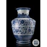 A blue and white porcelain vase, decorated with lotus and geometric bands, with apocryphal