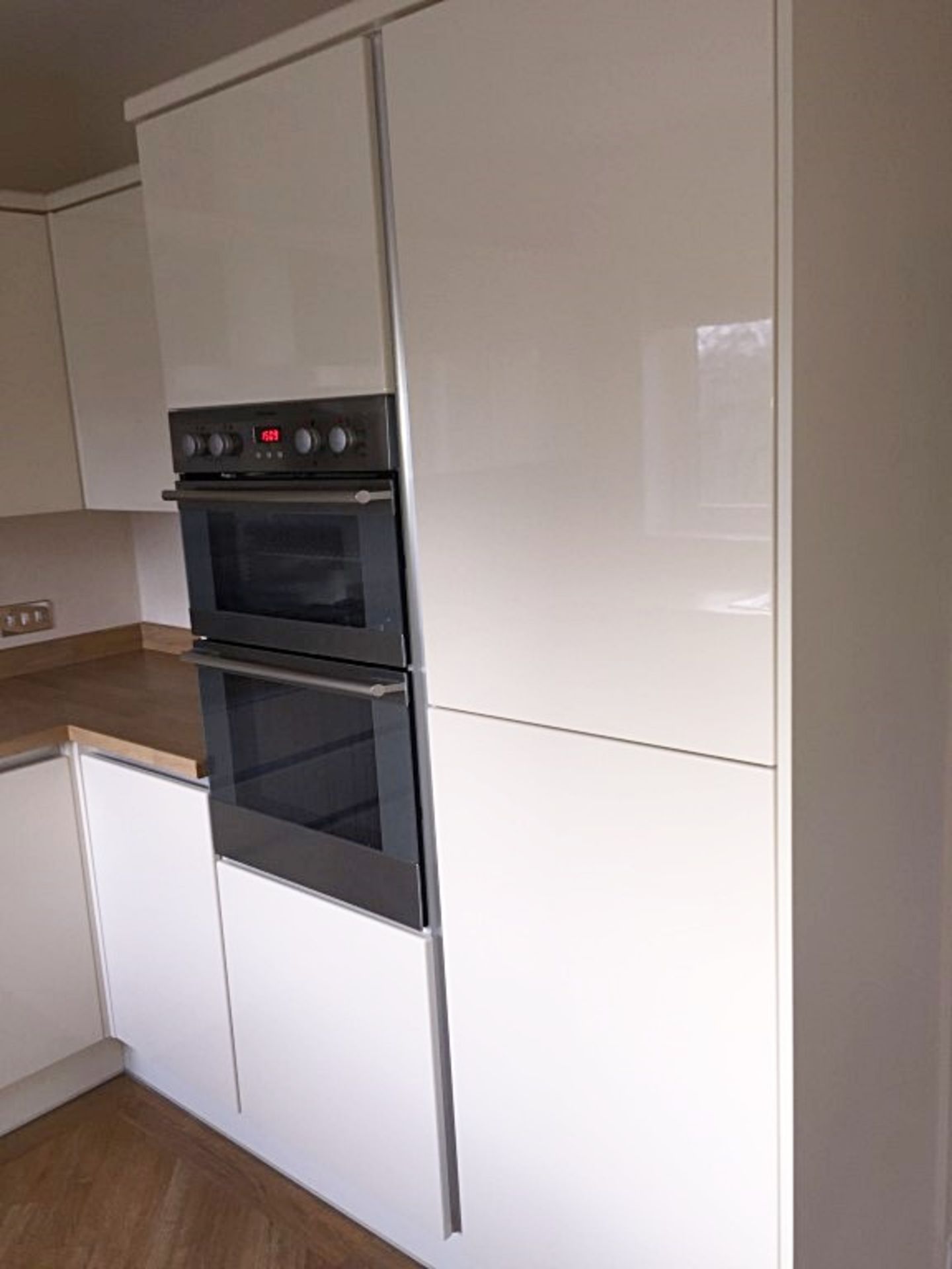 1 x Panorama Modern White Gloss Handless Kitchen With Timber Worktop And Appliances – Approx 2 years - Image 2 of 40