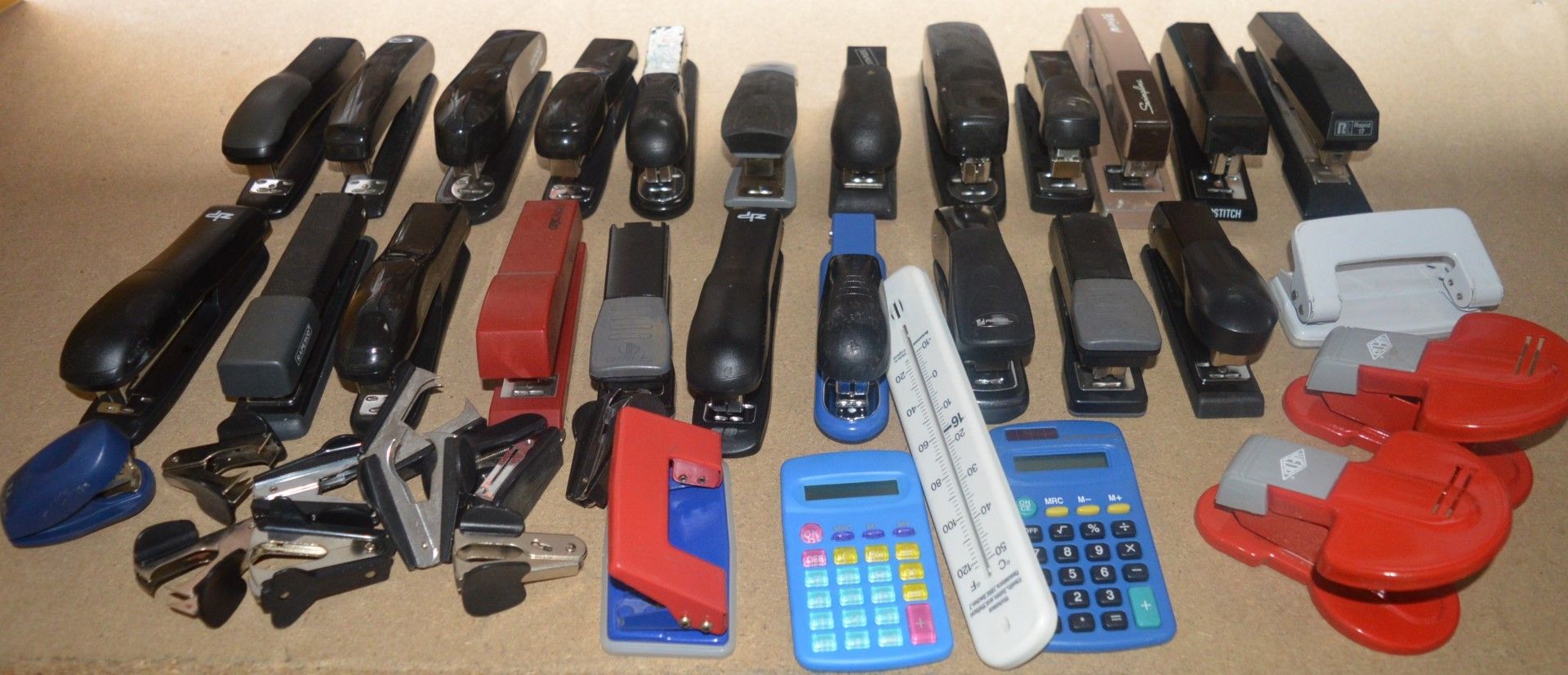 Approx 40 x Various Pieces of Office Stationary - Includes Staplers, Calculators, Hole Punches and