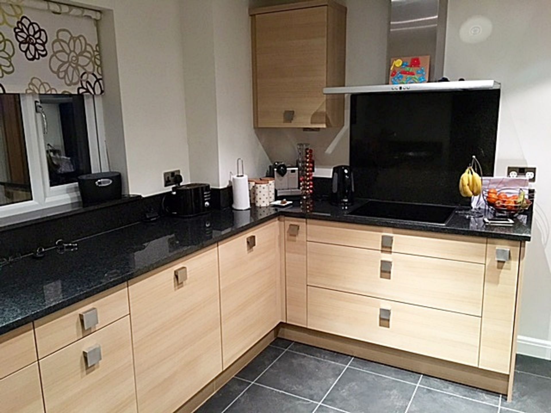 1 x Quality Hacker Kitchen With Neff Appliances And Black Granite worktop surfaces - Presented In