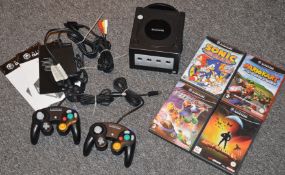 1 x Nintendo Gamecube Games Console With 2 Controllers, Power Adaptor, AV Lead, Instructions and 4