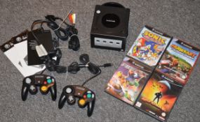 1 x Nintendo Gamecube Games Console With 2 Controllers, Power Adaptor, AV Lead, Instructions and 4