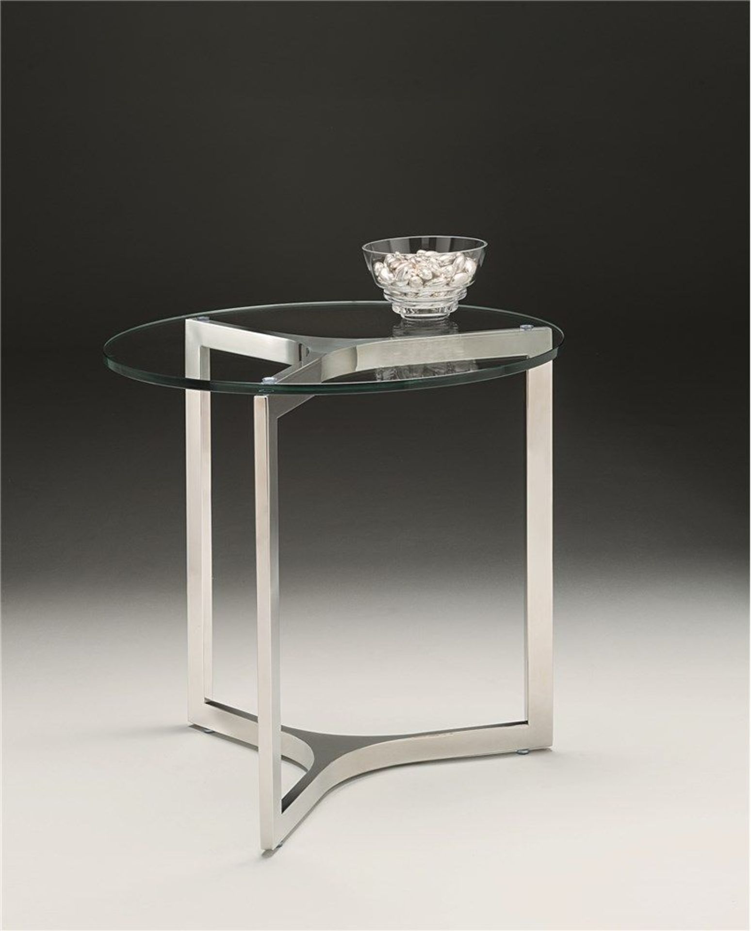 1 x Chelsom Revolve Lamp Table - CL081 - Laser Cut Polished Stainless Steel Base With Clear Tempered