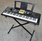 1 x Yamaha YPT-220 Portable Keyboard With Power Adator and Stand - Features 375 High uality Instrume