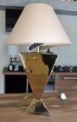 1 x Triangular Gloss Bronze Coloured Lamp with Cream Shade.