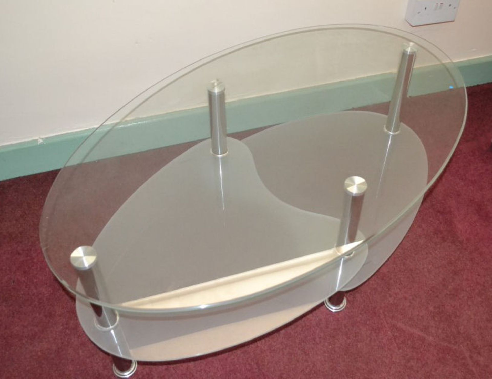 1 x Contemporary Glass and Stainless Steel Oval Coffee Table With 2 Tiered Shelves - Image 3 of 5
