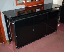 1 x Black Glass Sideboard Unit With Push-to-Open Doors and Silver Legs