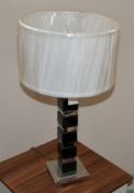 1 x Silver And Black Lamp, White Shade. Total Height 62cm.