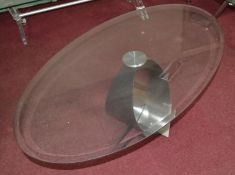 1 x Glass Coffee Table. Metal Leg. Glass Top Has Bevelled Edge. 122cm Long. Width 71cm. Height 46cm