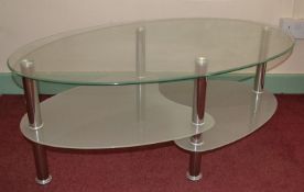 1 x Contemporary Glass and Stainless Steel Oval Coffee Table With 2 Tiered Shelves