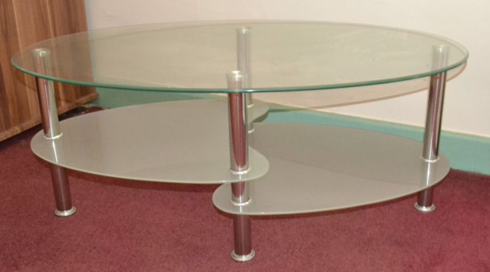 1 x Contemporary Glass and Stainless Steel Oval Coffee Table With 2 Tiered Shelves - Image 5 of 5