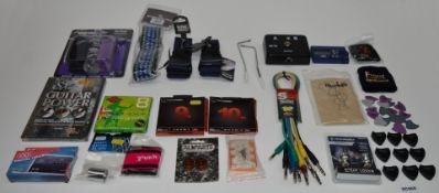 1 x Assorted Collection of Guitar Accessories - Includes Guitar Straps, DVD, Plectrums, Guitar