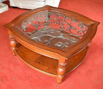 1 x Chunky Mahogany Coffee Table Featuring Glass Top And Metal Decoration - From A Clean Manor House