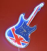 1 x Illuminated Neon Britpop Guitar Shaped Clock - Preowned In Very Good Working Condition -