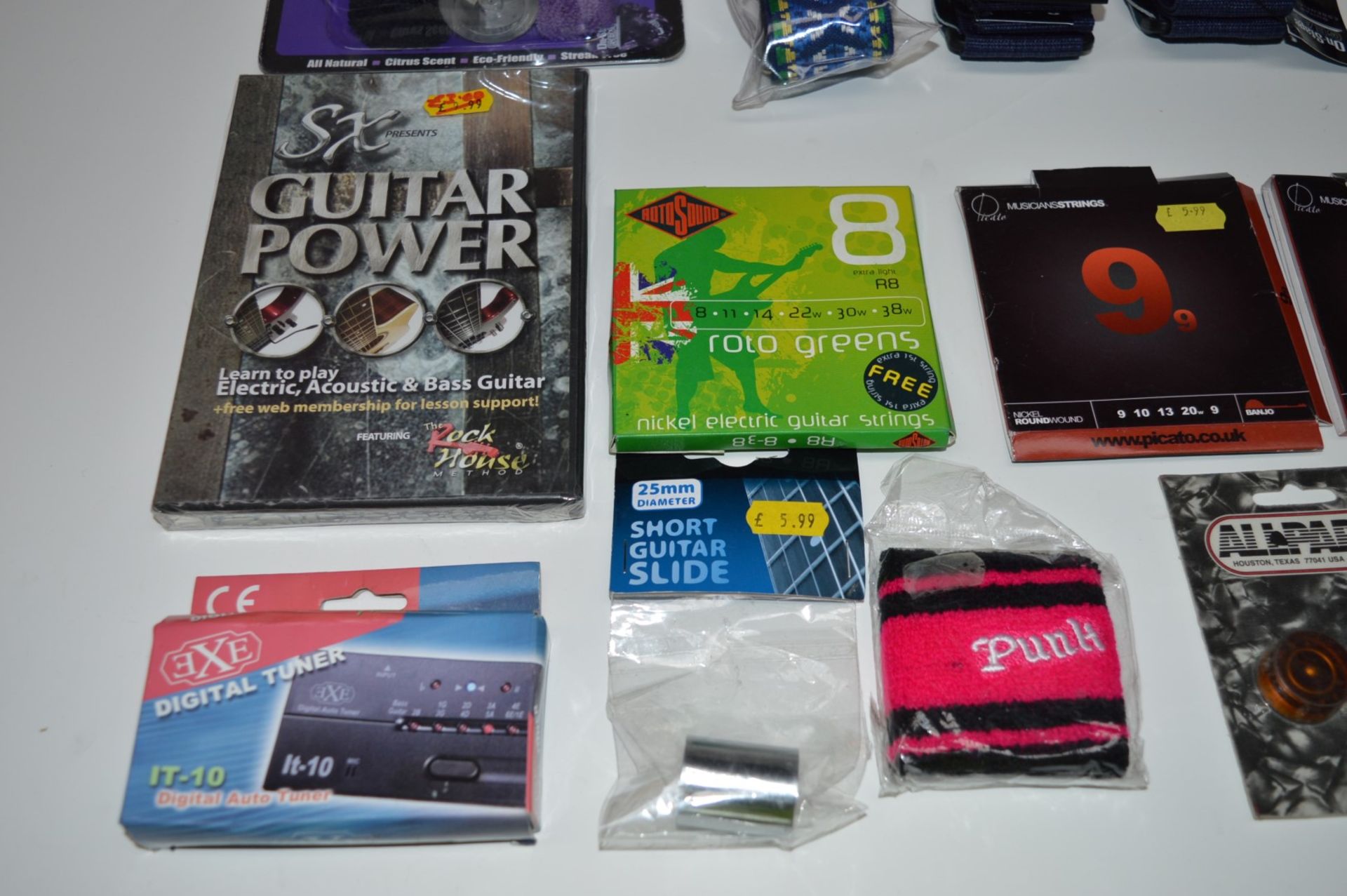 1 x Assorted Collection of Guitar Accessories - Includes Guitar Straps, DVD, Plectrums, Guitar - Image 2 of 13