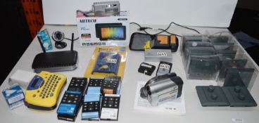 1 x Assorted Collection of Electrical Items - Samsung Camcorder, Netgear Router, Brother Label