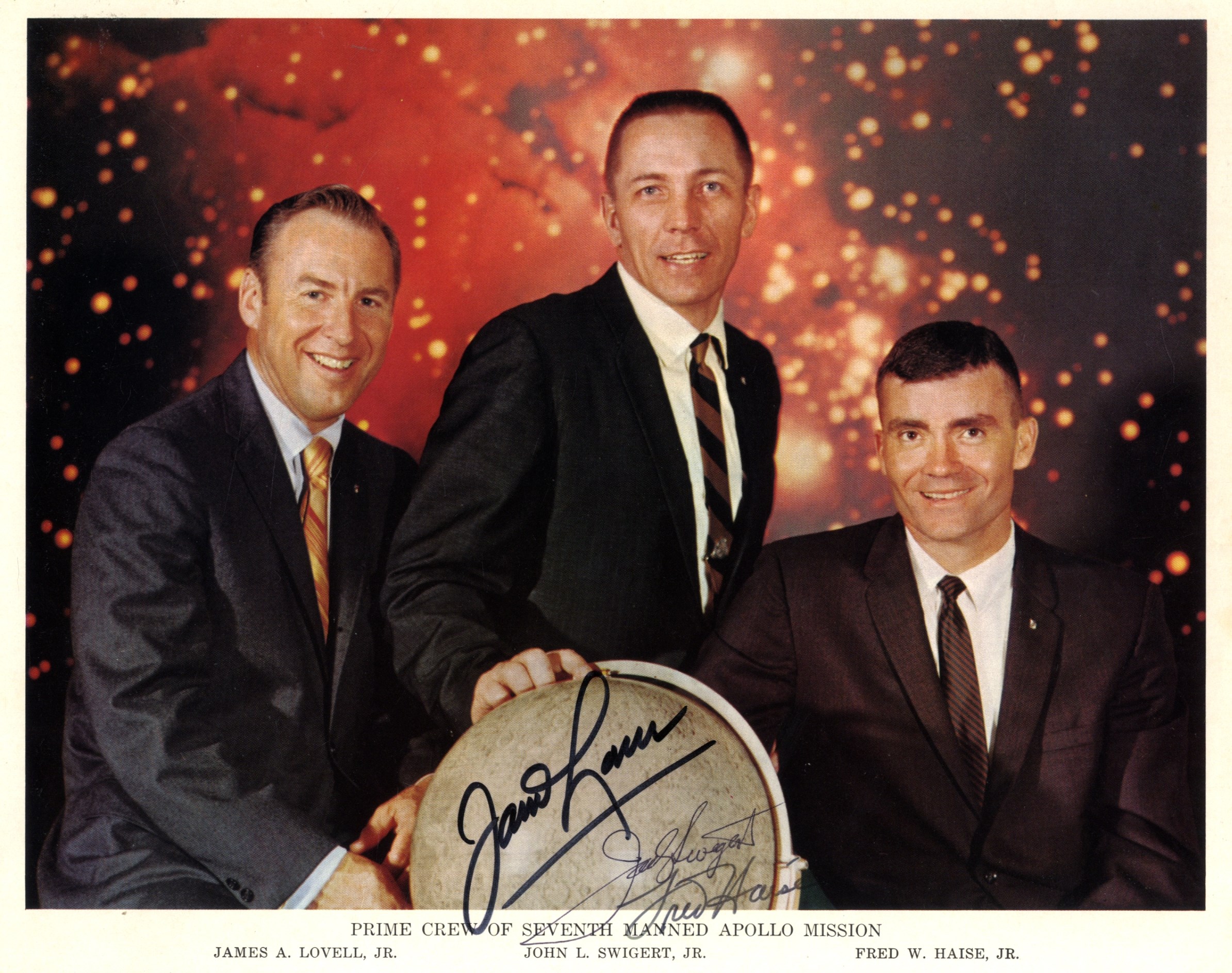 APOLLO XIII: A good signed colour 10 x 8 photograph by all three crew members of the ill-fated