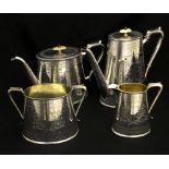 Servizio da tea e caffè quattro pezzi in sheffield cesellati a motivi classici con interni in