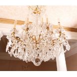 *20th c French Bronze and Crystal Chandelier Louis XVI styel with eighteen lights. 39"h Very good
