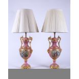 Pair of Pink Sevres Style Mounted Table Lam[ in gilt bronze with romantic scenes. 20 3/4" to top