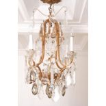 *Fine Small and Long Chandelier with prisms. Approx. 28"h x 19"w missing a few prisms