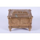 Covered Gilt Box with floral decoration. 4"x5.5"