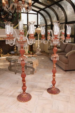 Pair of 20th C Bohemian Style Glass Torchieres of gilt decorated clear and ruby colored glass. 65"