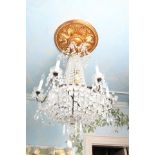 *Six Light Chandelier with row of tear drop prisms. 33"h x 25 1/2"w Good condition