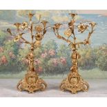 Louis XV Style Gilt Bronze Putti Candelabra 19th c., a single putti supporting three lights with